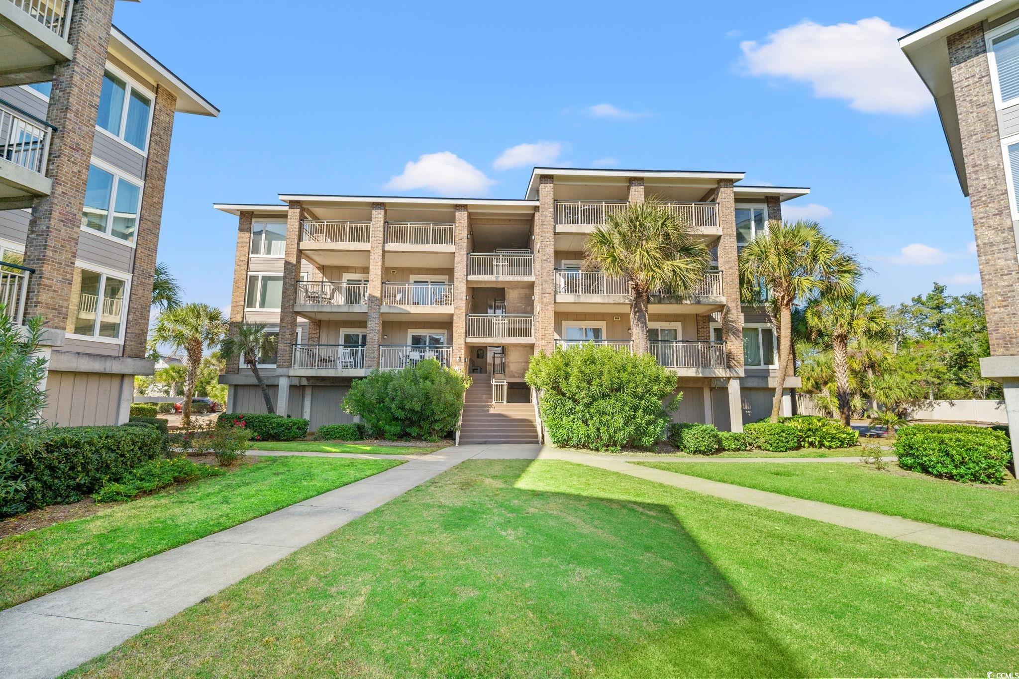 320 Myrtle Avenue Pawleys Island, SC 29585 - Photo 4 of 38 View of apartment building / complex