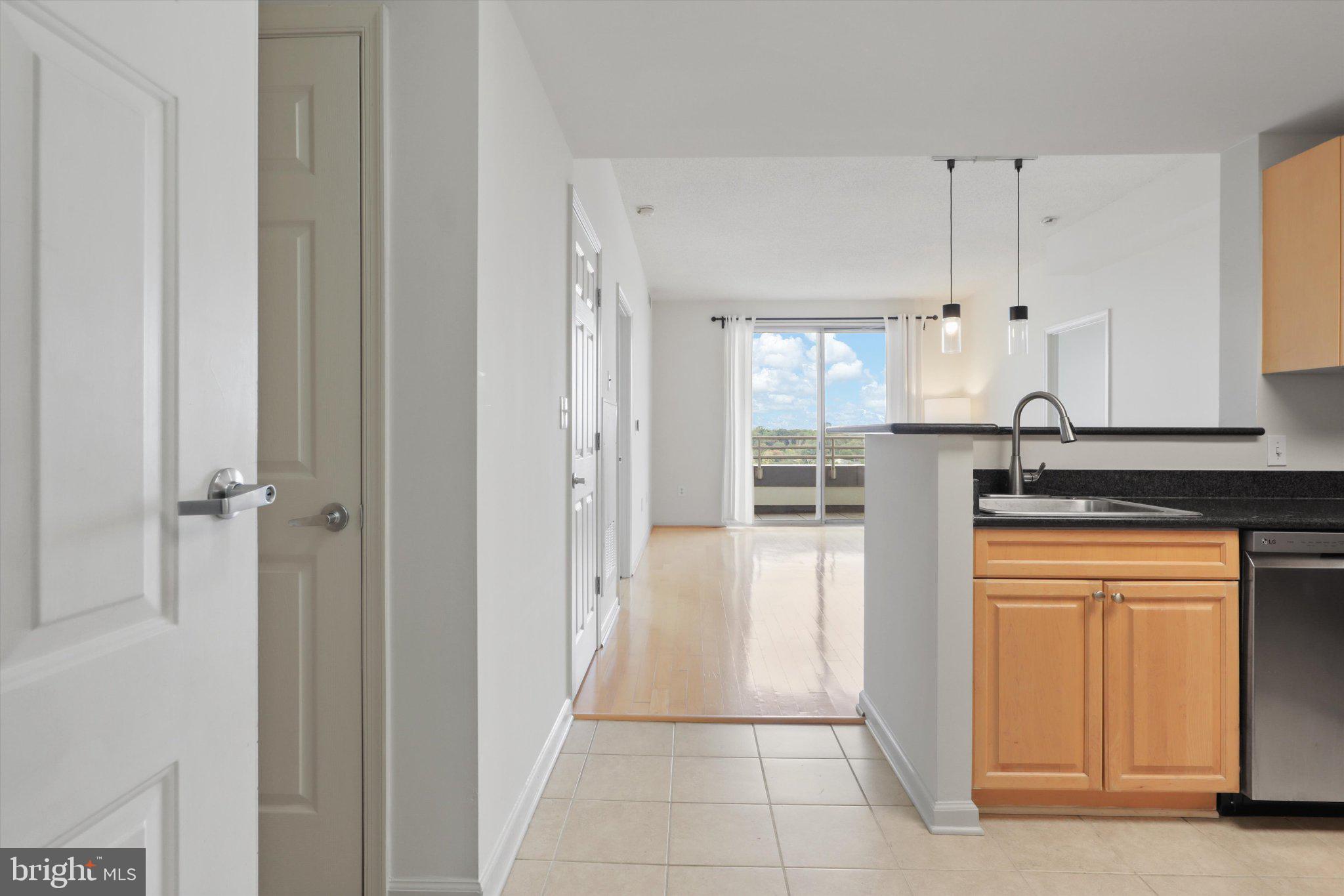2726 Gallows Road, Unit 1506 Vienna, VA 22180 - Photo 6 of 35 Bright and airy open-concept space.