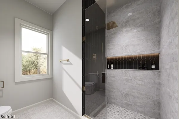 a bathroom with a double vanity sink a mirror and a bathtub