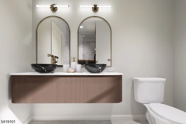 a bathroom with a sink a mirror and a shower