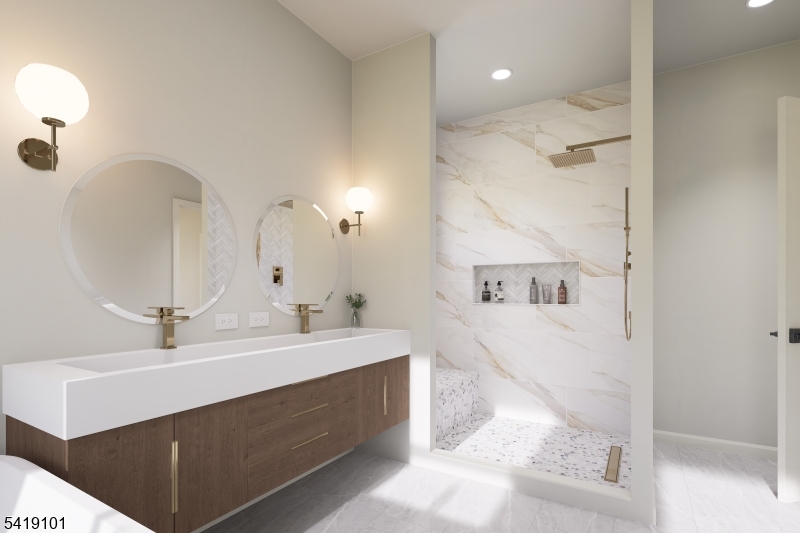 755 River Road Chatham, NJ 07928 - Photo 19 of 24 a bathroom with a sink a mirror and a shower