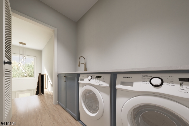 755 River Road Chatham, NJ 07928 - Photo 23 of 24 a utility room with dryer and washer