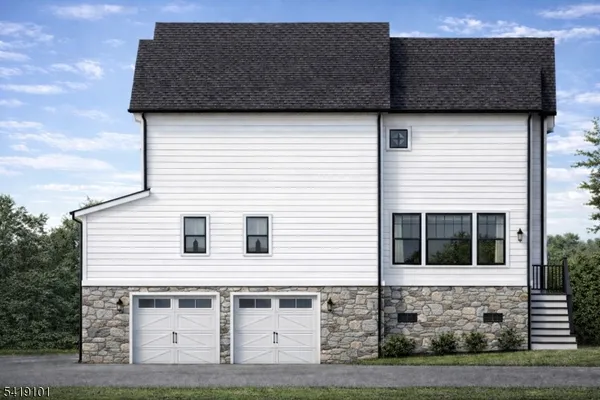 a view of front of house with garage
