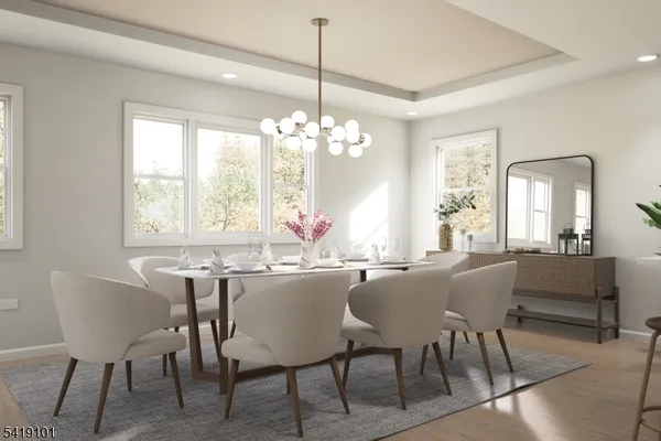a view of a dining room with furniture and window