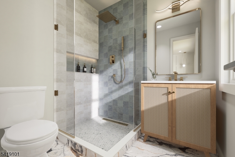 755 River Road Chatham, NJ 07928 - Photo 10 of 24 a bathroom with a granite countertop sink a toilet a mirror and shower