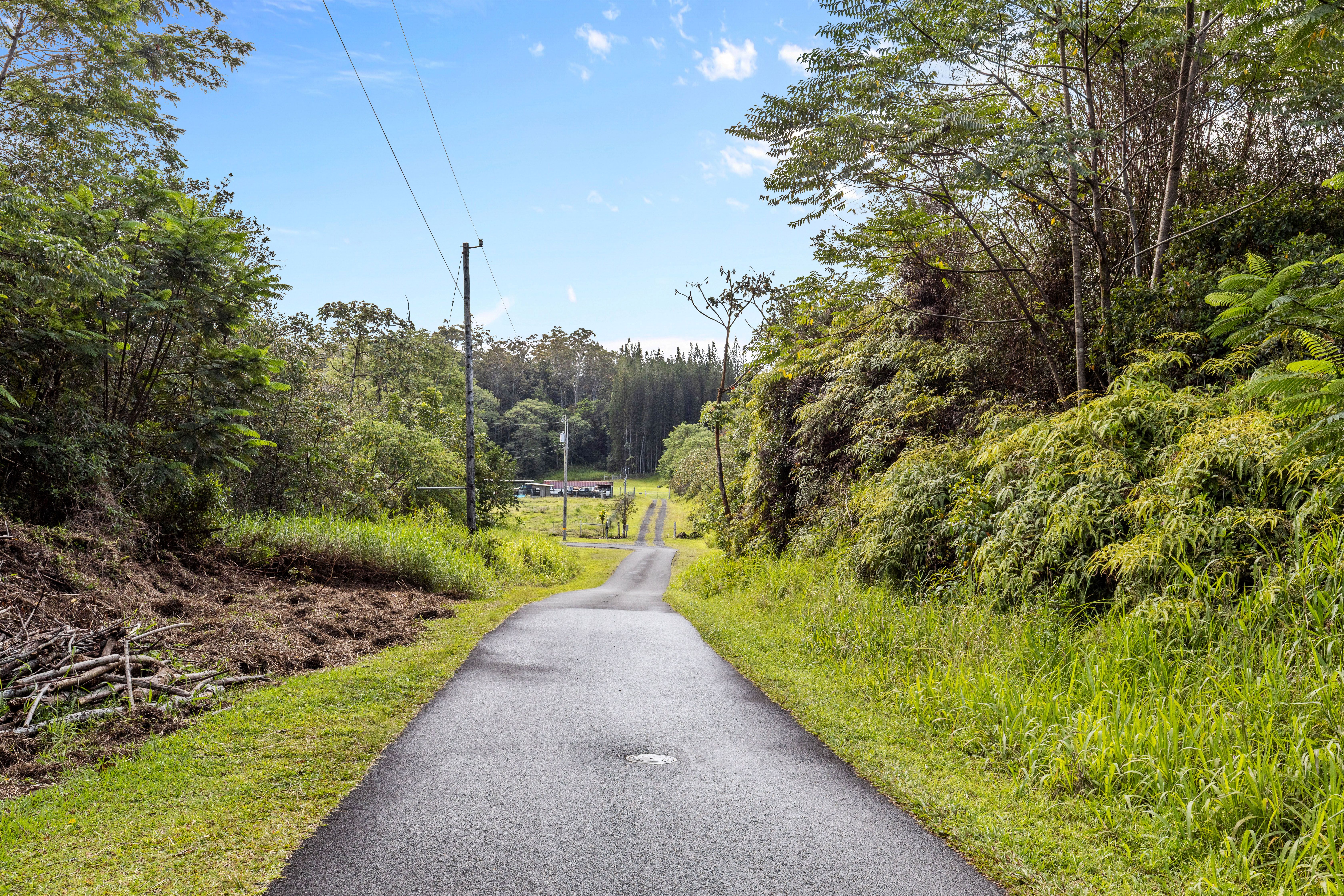 4 Ainalako Road Hilo, HI 96720 - Photo 12 of 18 a view of a pathway both side of building