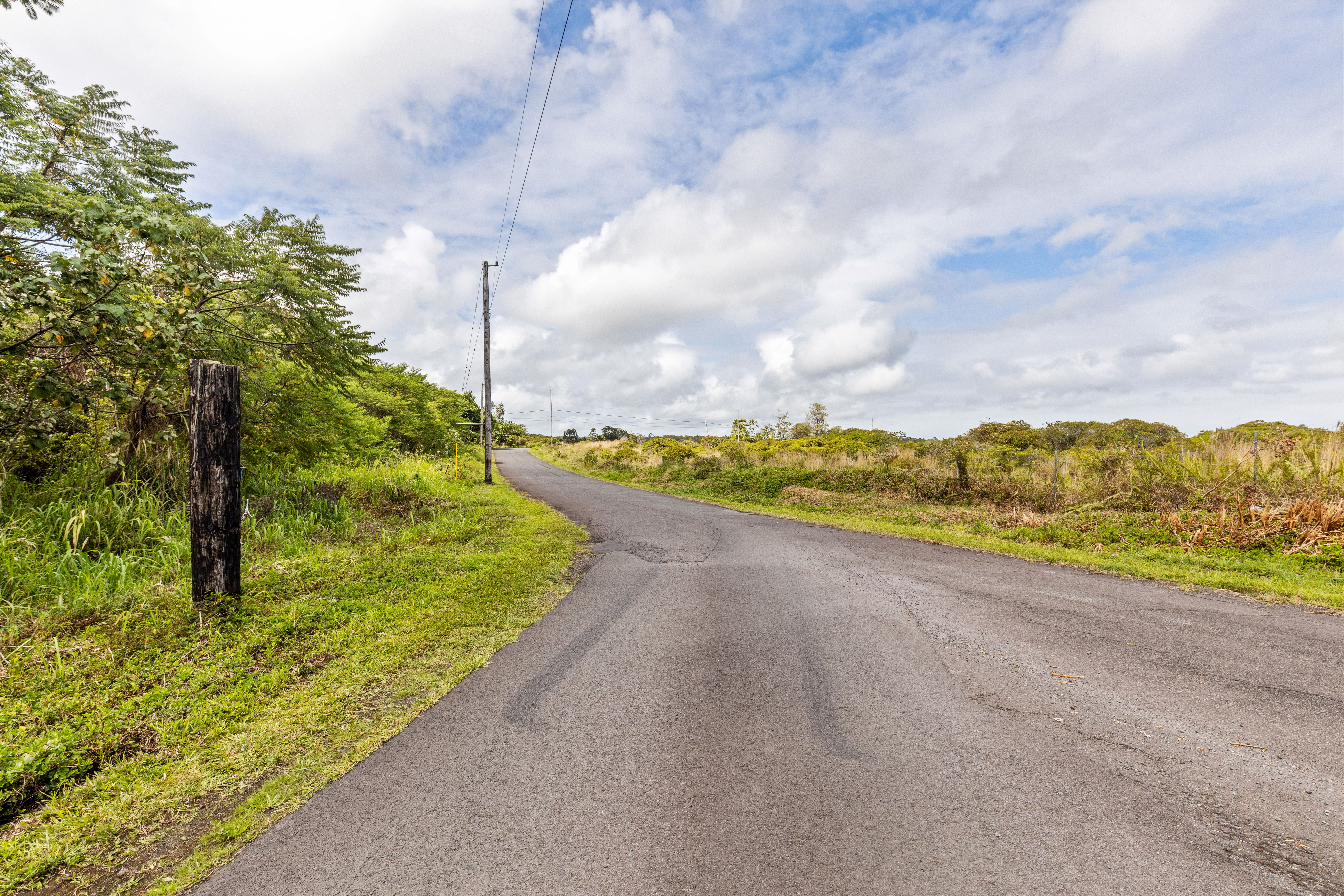 4 Ainalako Road Hilo, HI 96720 - Photo 13 of 18 a view of an ocean and a mountain