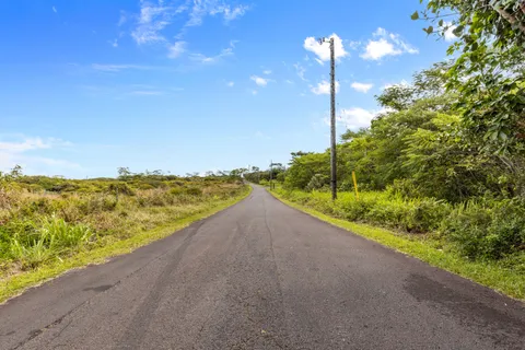 a view of a city street from a balcony
