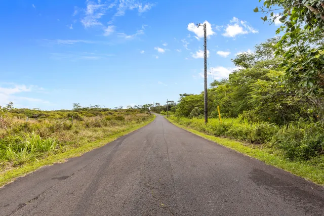 a view of a city street from a balcony