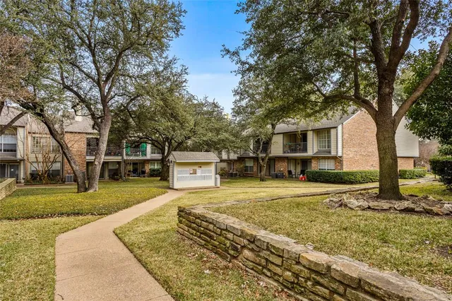 a swimming pool with outdoor seating and yard