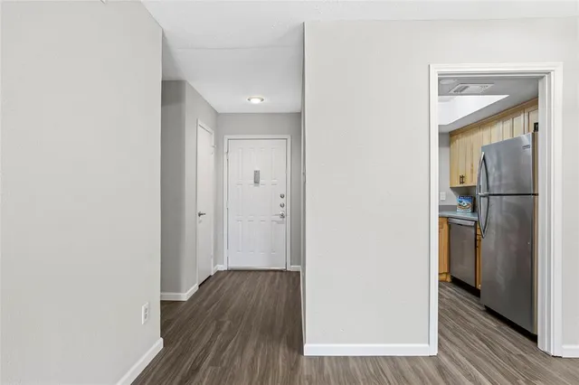 a kitchen with a stove and a sink
