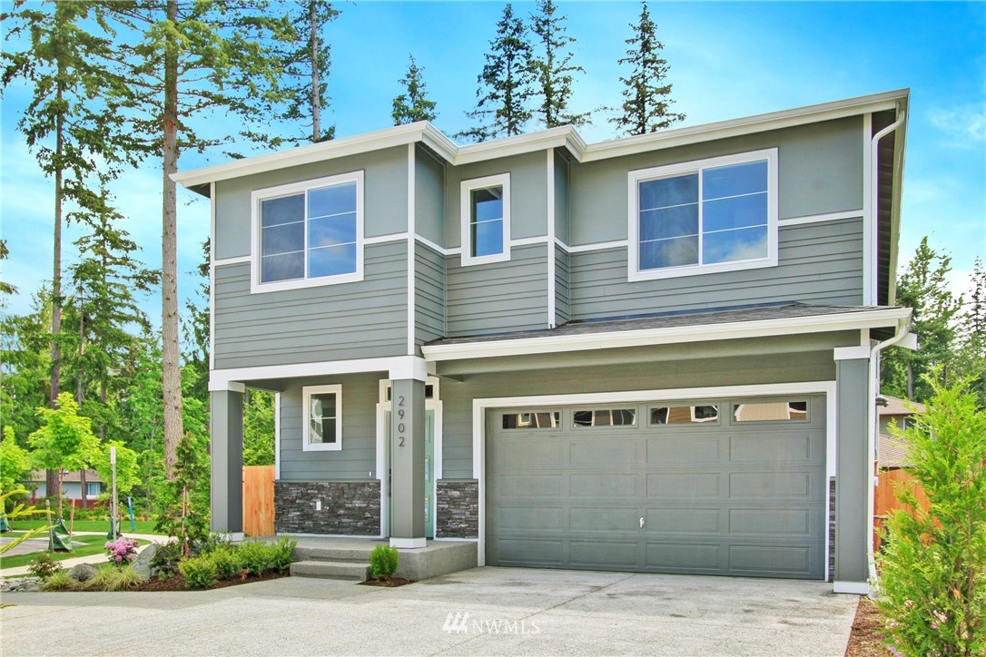130 180th Place Southwest, Unit CT 03 Bothell, WA 98012 - Photo 1 of 20 a front view of a house