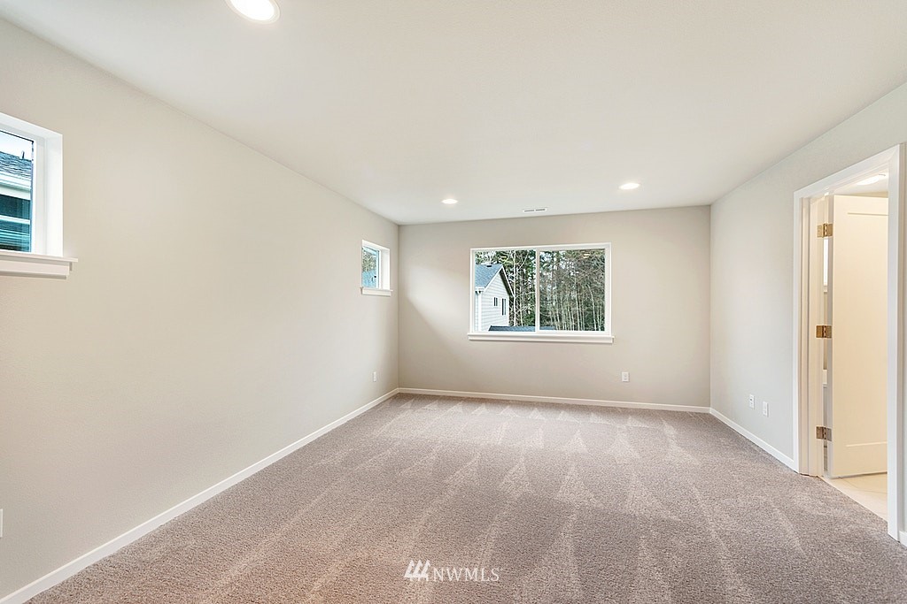 130 180th Place Southwest, Unit CT 03 Bothell, WA 98012 - Photo 13 of 20 an empty room with windows