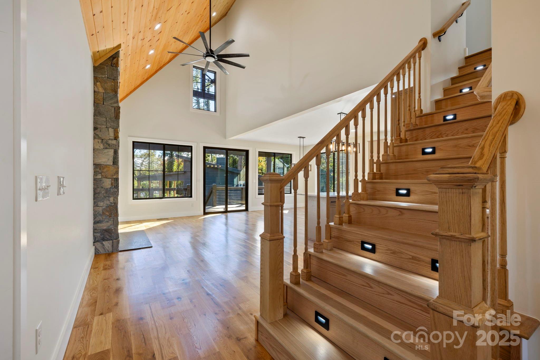 154 Osceola Road Hendersonville, NC 28739 - Photo 12 of 38 a view of entryway and hall with wooden floor