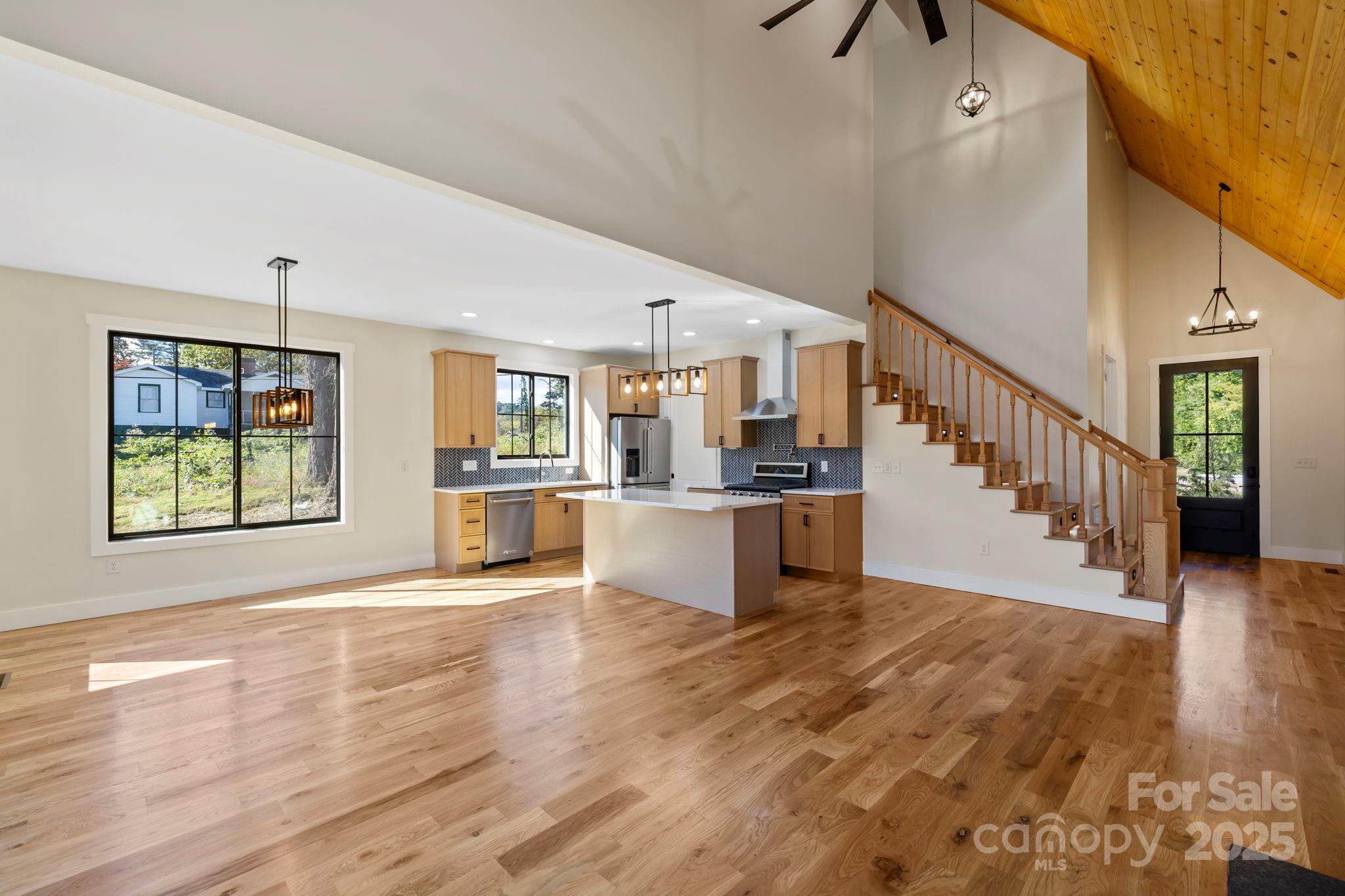 154 Osceola Road Hendersonville, NC 28739 - Photo 17 of 38 a view of kitchen with furniture and a window