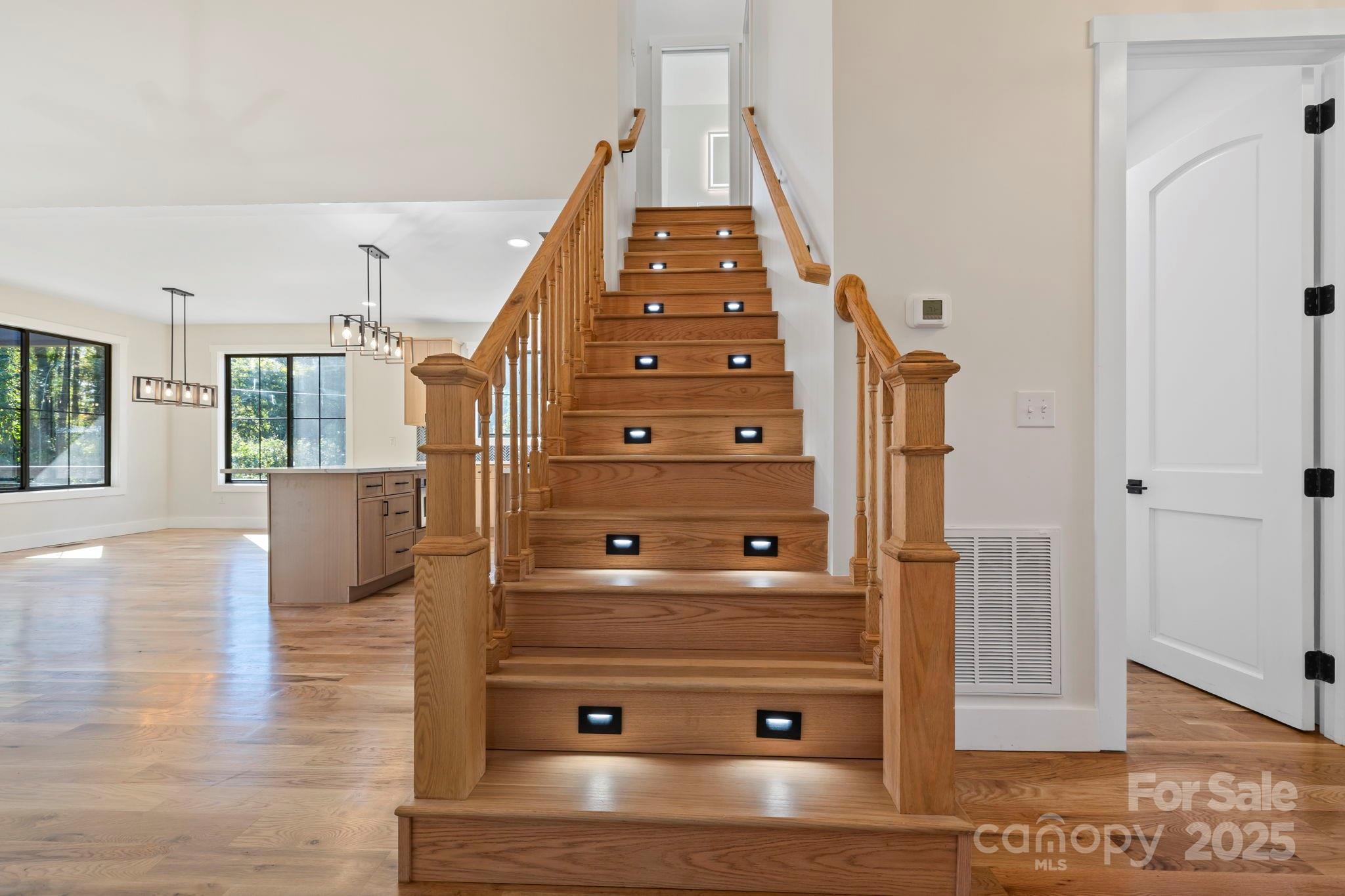 154 Osceola Road Hendersonville, NC 28739 - Photo 29 of 38 a view of an entryway with wooden floor