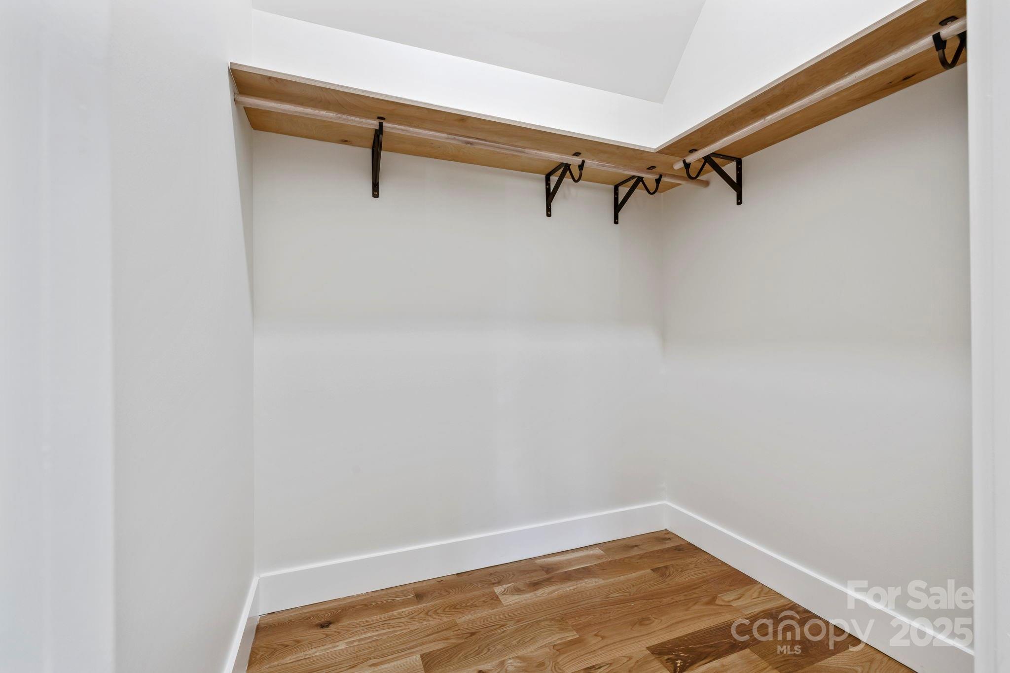 154 Osceola Road Hendersonville, NC 28739 - Photo 33 of 38 a view of a room with racks on the wall