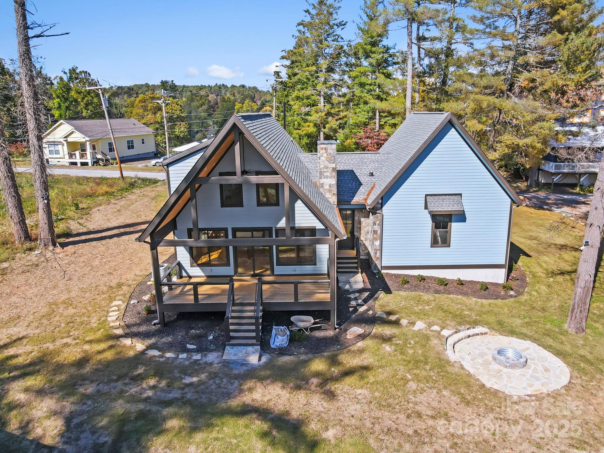 154 Osceola Road Hendersonville, NC 28739 - Photo 36 of 38 a view of a house with a swimming pool
