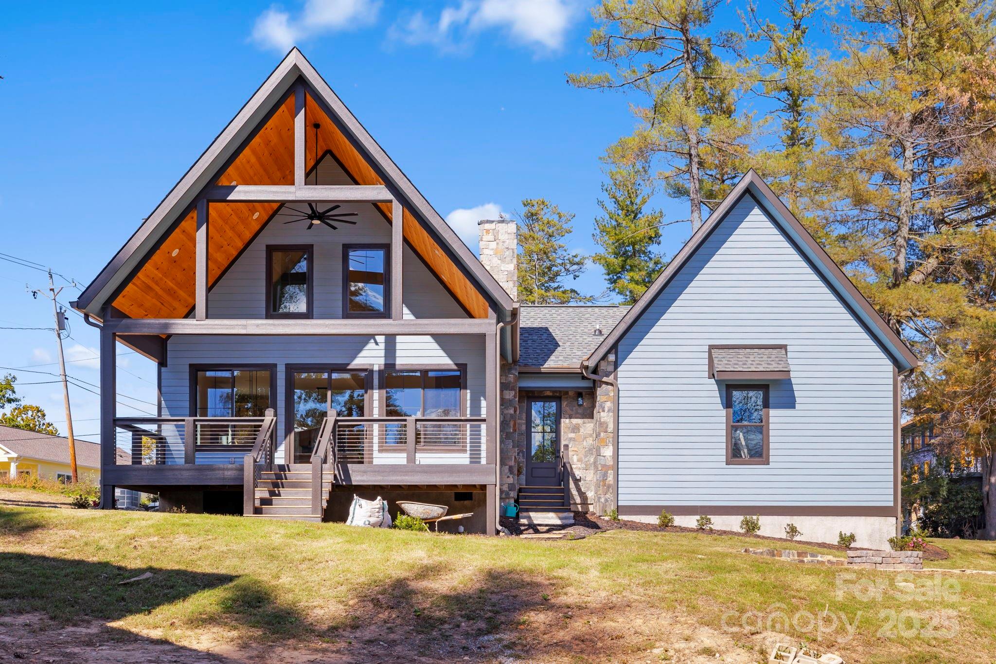 154 Osceola Road Hendersonville, NC 28739 - Photo 6 of 38 a front view of house with yard