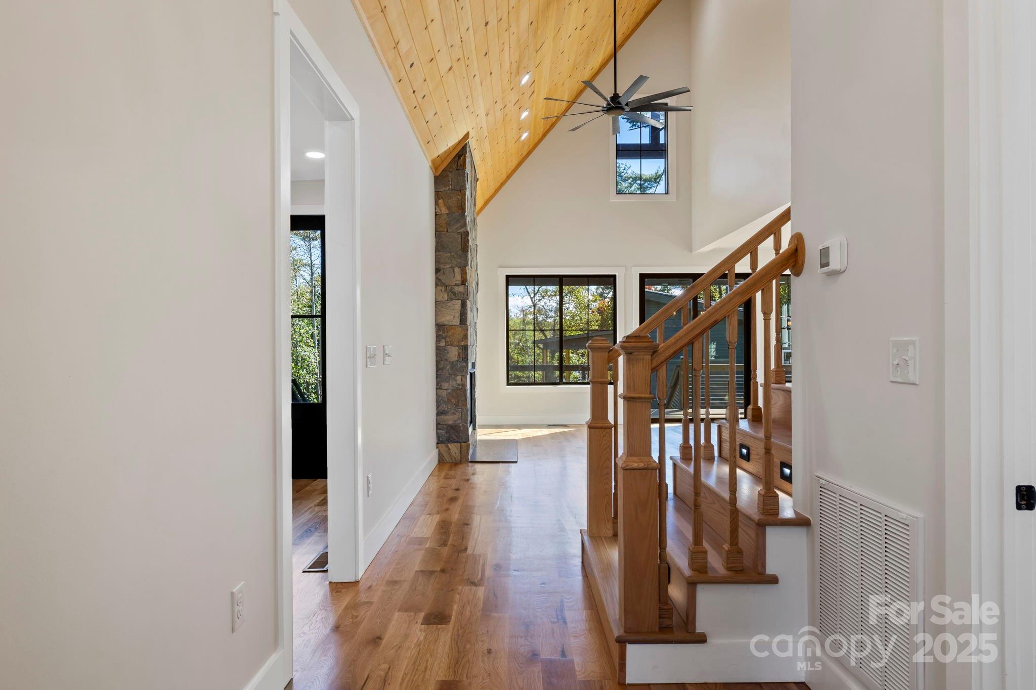 154 Osceola Road Hendersonville, NC 28739 - Photo 10 of 38 a view of entryway and hall with wooden floor
