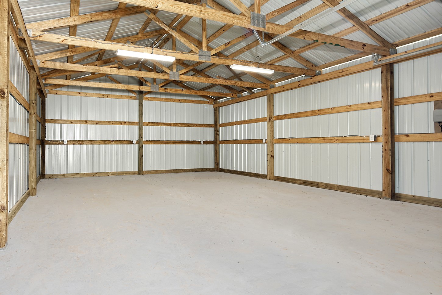 15728 Woodlife Road Willis, TX 77378 - Photo 4 of 36 Incredible 24'x30' shop is a terrific benefit and adds value to this property.