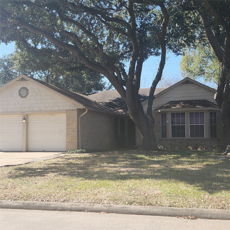 6443 Allerton Street Houston, TX 77084 - Photo 1 of 18 a view of a house with a snow in the yard