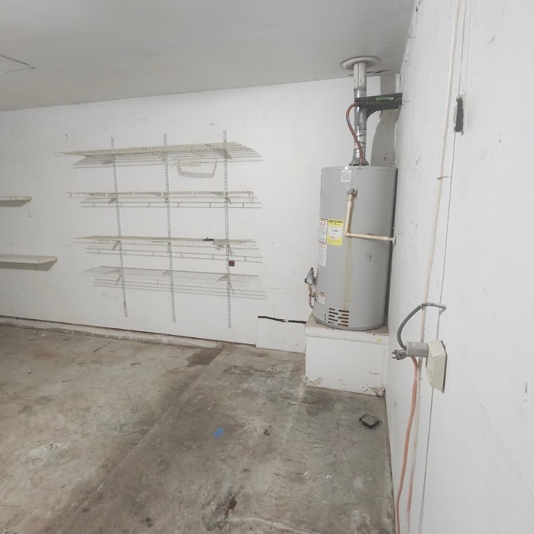 6443 Allerton Street Houston, TX 77084 - Photo 14 of 18 a view of a room with racks on the wall
