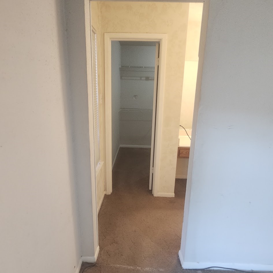 6443 Allerton Street Houston, TX 77084 - Photo 8 of 18 Master walk-in closet and access to bathroom