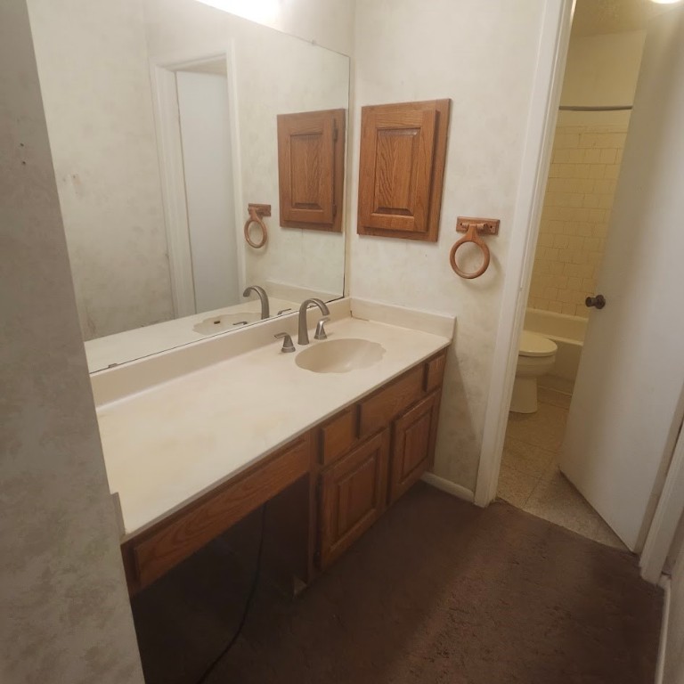 6443 Allerton Street Houston, TX 77084 - Photo 9 of 18 a bathroom with a sink and a mirror