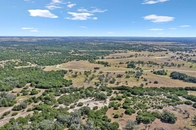 a view of a city with an ocean