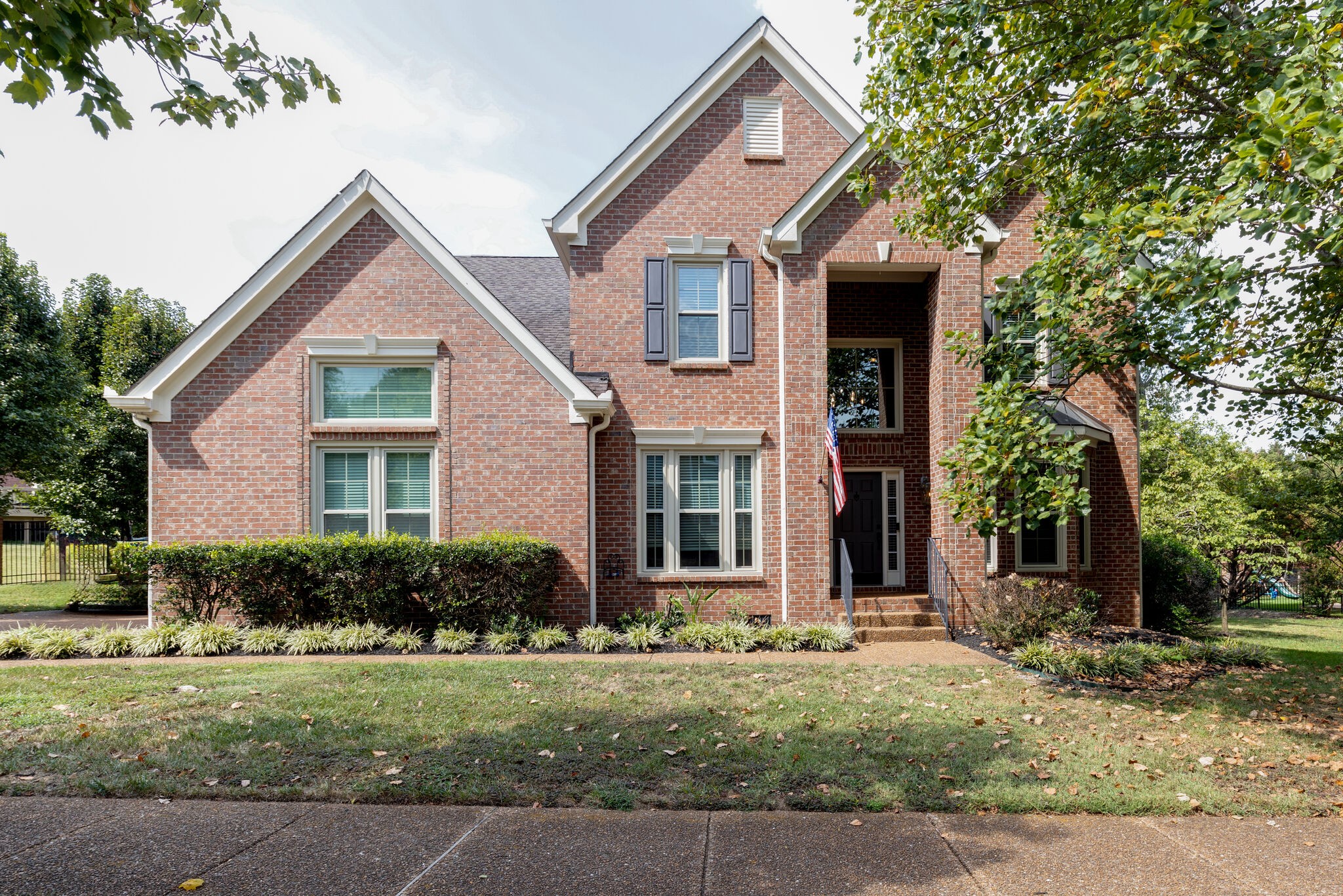 119 Richards Glen Drive Franklin, TN 37067 - Photo 1 of 41 a front view of a house with a yard
