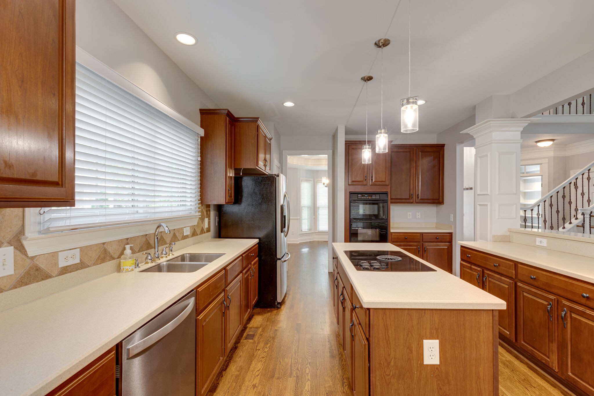 119 Richards Glen Drive Franklin, TN 37067 - Photo 11 of 41 a kitchen that has a sink a counter space stainless steel appliances and cabinets