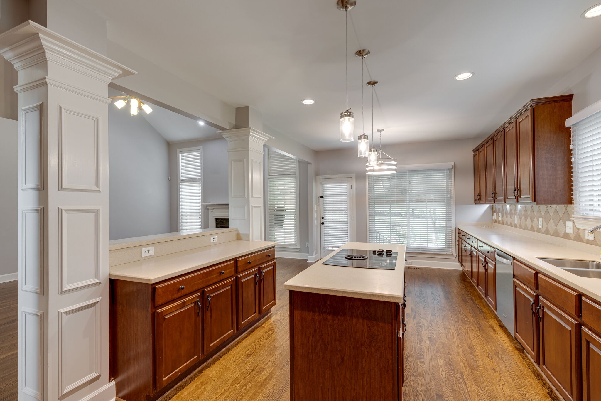 119 Richards Glen Drive Franklin, TN 37067 - Photo 13 of 41 a kitchen with kitchen island granite countertop lots of counter top space sink and refrigerator