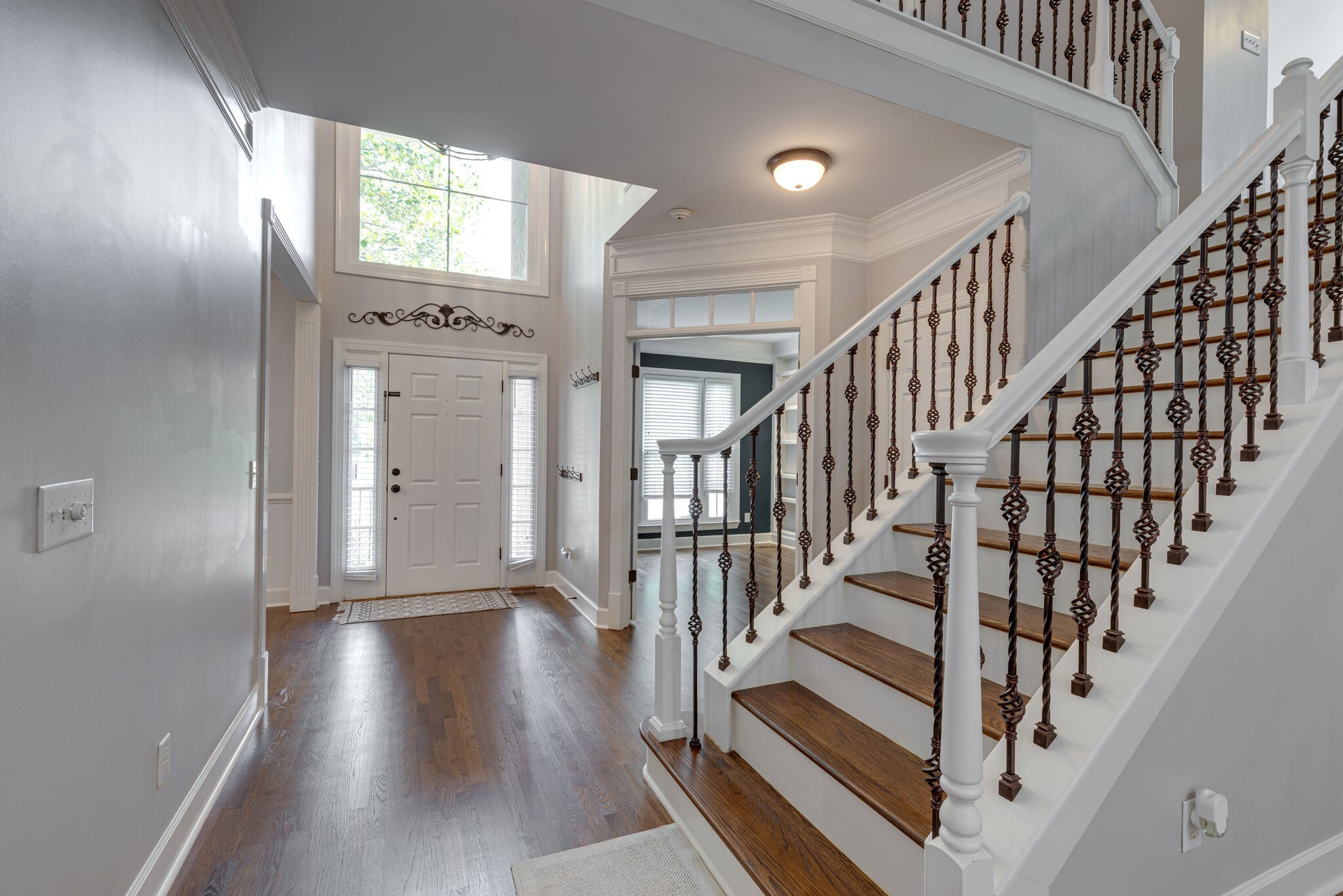 119 Richards Glen Drive Franklin, TN 37067 - Photo 23 of 41 a view of entryway with wooden floor and stairs