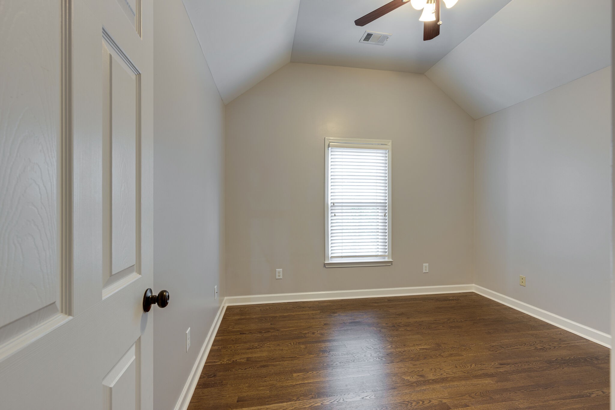 119 Richards Glen Drive Franklin, TN 37067 - Photo 32 of 41 an empty room with wooden floor cabinet and windows