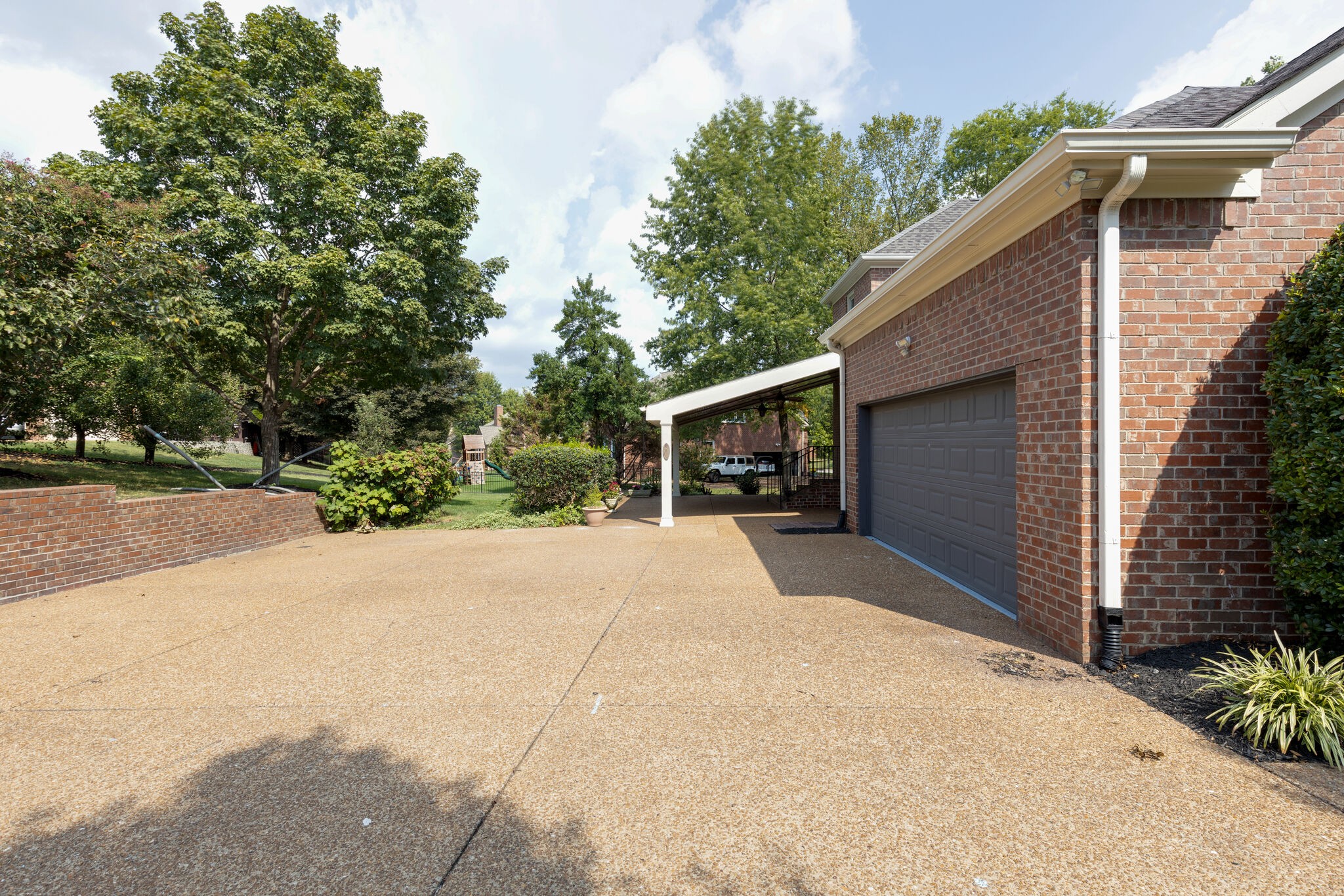 119 Richards Glen Drive Franklin, TN 37067 - Photo 39 of 41 a front view of a house with a yard and garage
