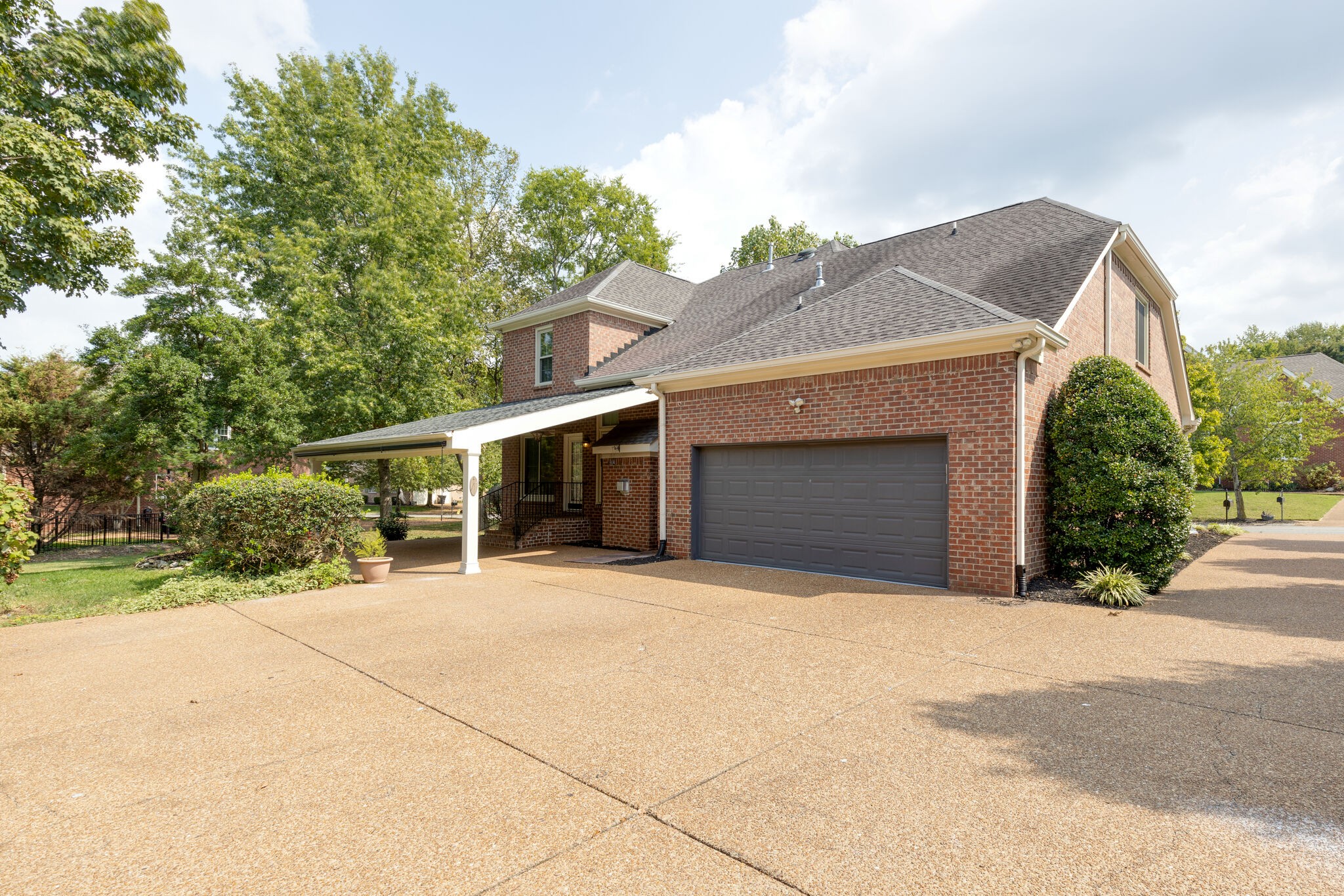 119 Richards Glen Drive Franklin, TN 37067 - Photo 40 of 41 a front view of house with yard and trees in the background
