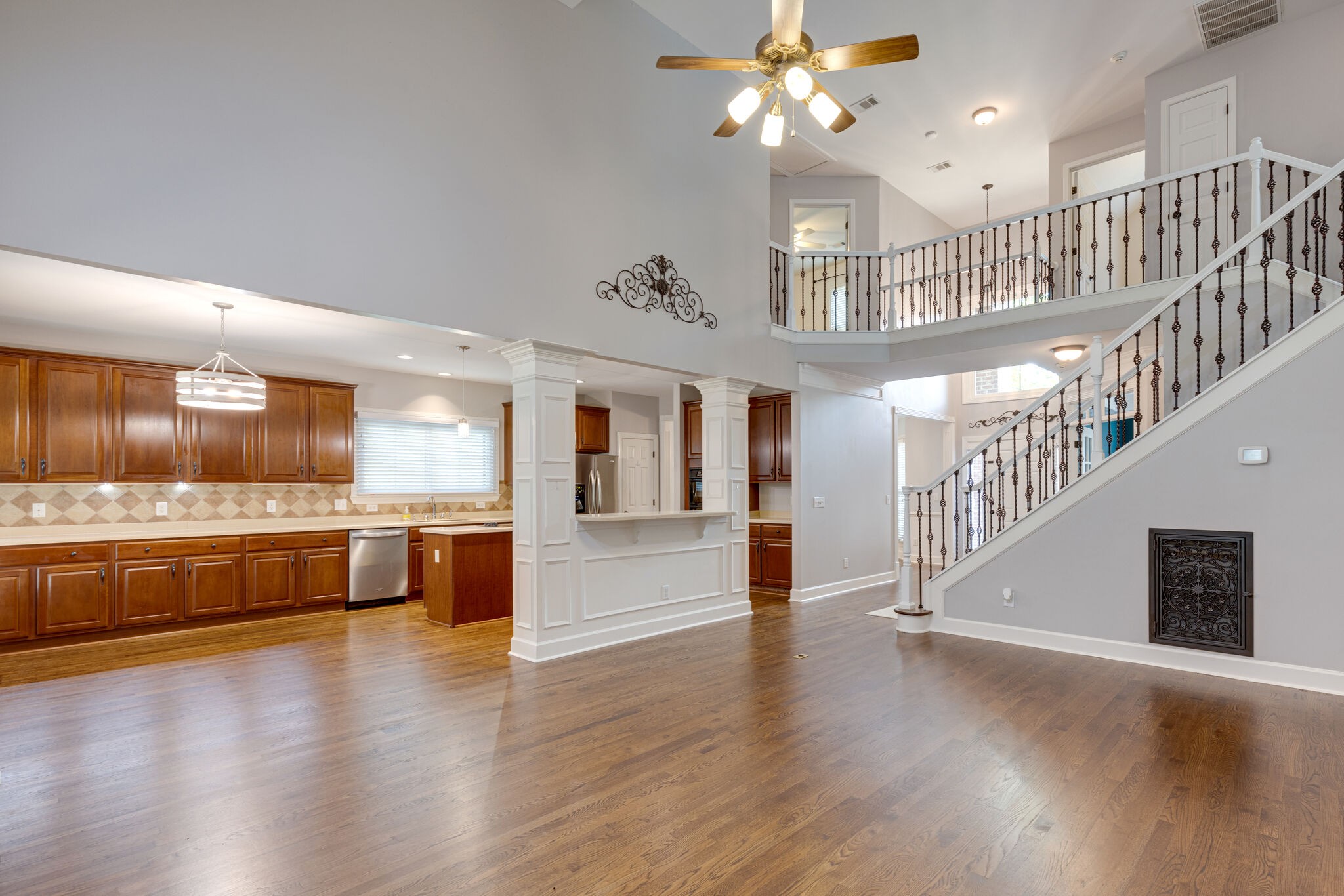 119 Richards Glen Drive Franklin, TN 37067 - Photo 7 of 41 a view of a living room and kitchen with a large window