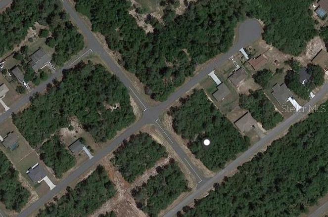 Southwest 162nd Street Ocala, FL 34473 - Photo 1 of 1 an aerial view of multiple houses with yard
