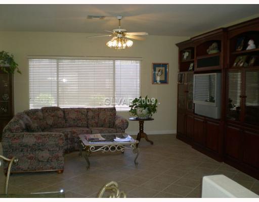 3029 Fort Stanwix Road Henderson, NV 89052 - Photo 3 of 11 Living Room. GREAT ROOM WITH CHERRY TV CABINET