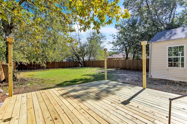 a view of backyard with green space