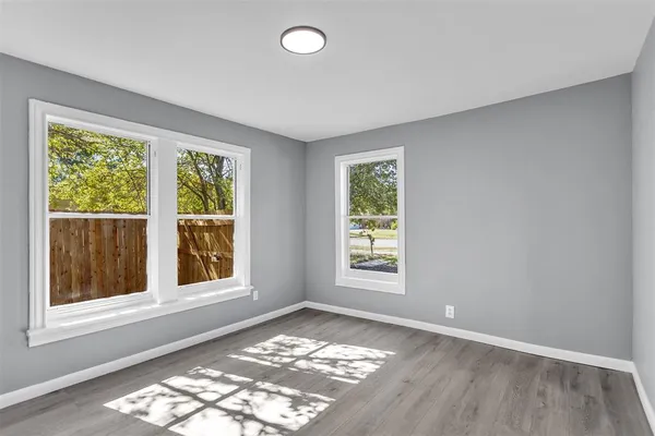 an empty room with windows