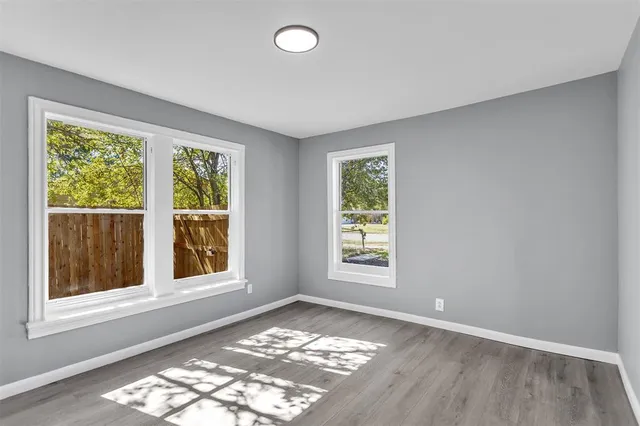 an empty room with windows