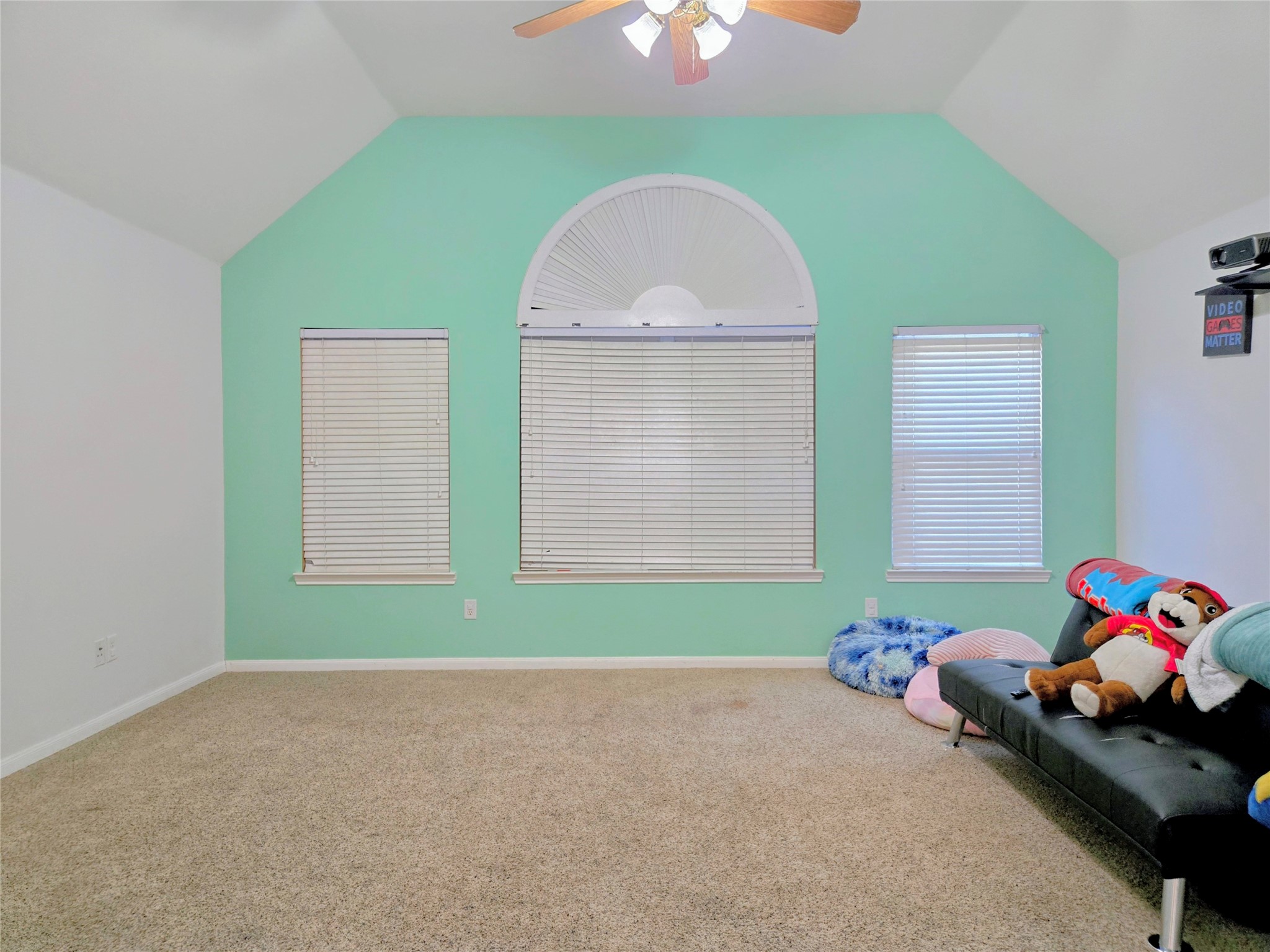 9211 Memorial Grove Drive Spring, TX 77379 - Photo 20 of 38 a room with toys and a wooden floor