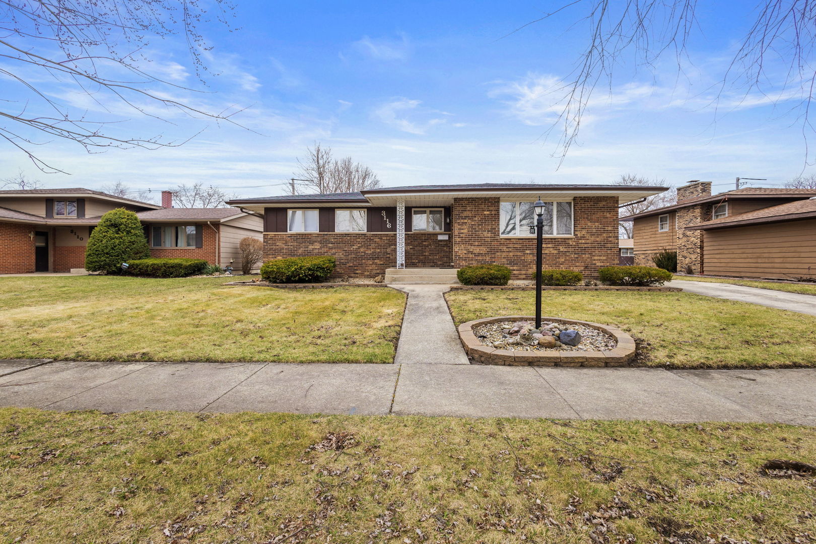3116 191st Place Lansing, IL 60438 - Photo 2 of 19 a view of a house with backyard and sitting area