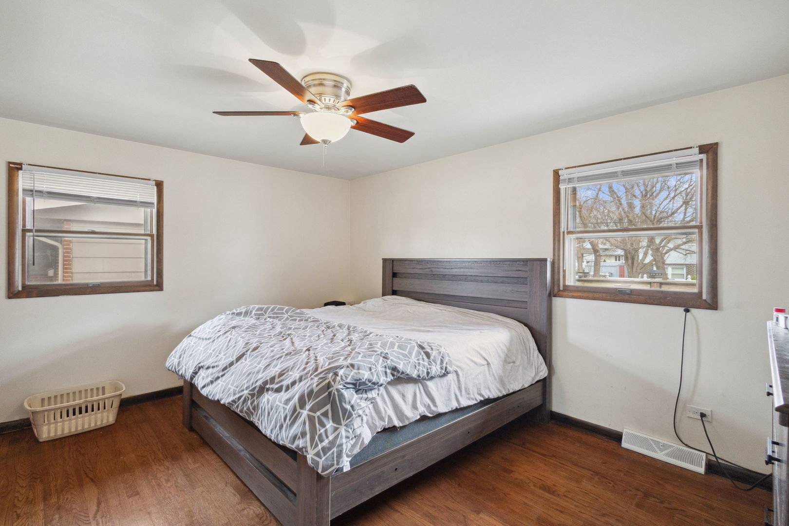 3116 191st Place Lansing, IL 60438 - Photo 9 of 19 a bedroom with a bed and painting on the wall