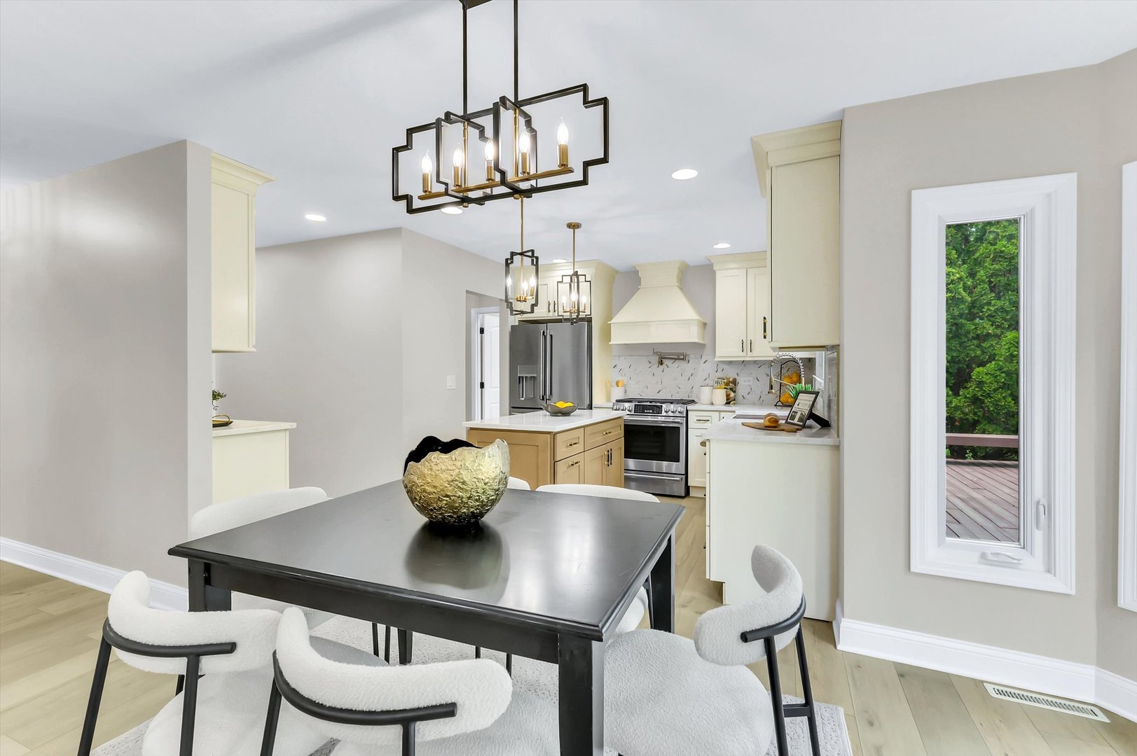 967 West Bauer Road Naperville, IL 60563 - Photo 15 of 37 a view of a dining room with furniture a chandelier and wooden floor