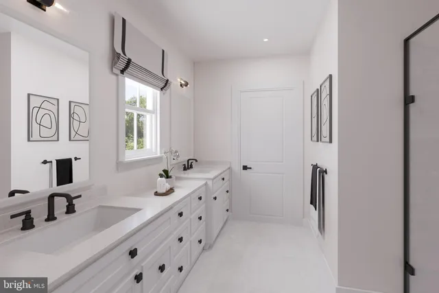 a bathroom with double vanity sink a mirror and a shower