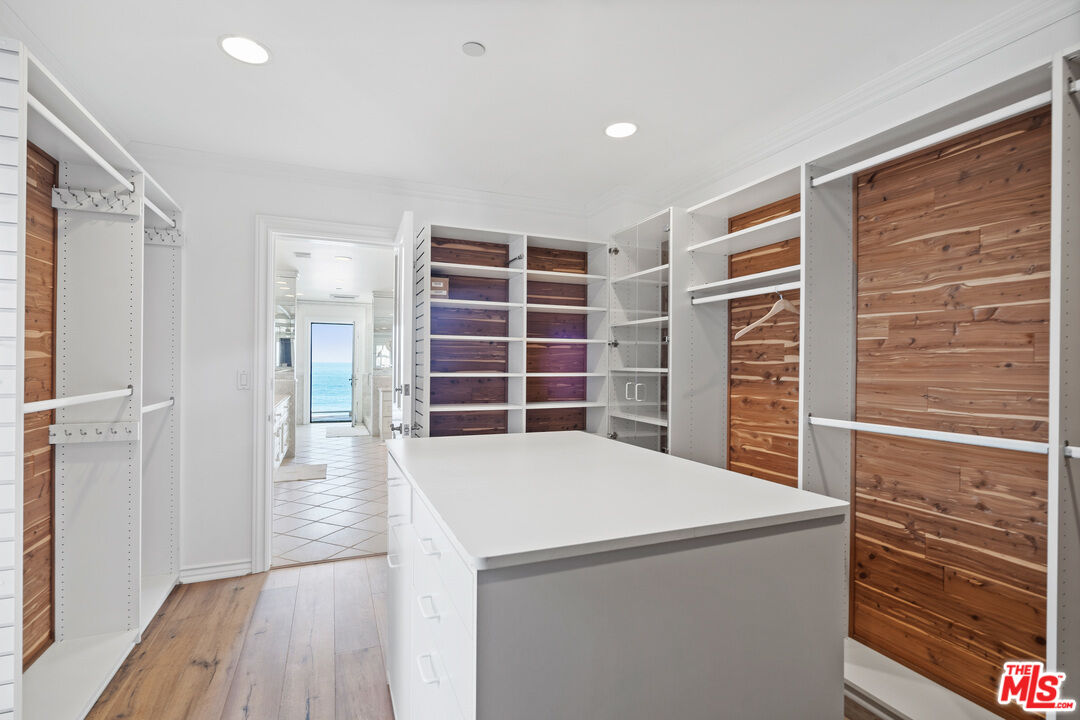 31444 Broad Beach Road Malibu, CA 90265 - Photo 20 of 36 a view of empty room with wooden floor and windows