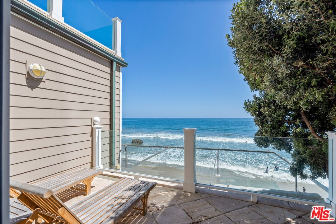31444 Broad Beach Road Malibu, CA 90265 - Photo 24 of 36 a view of a balcony with two chairs